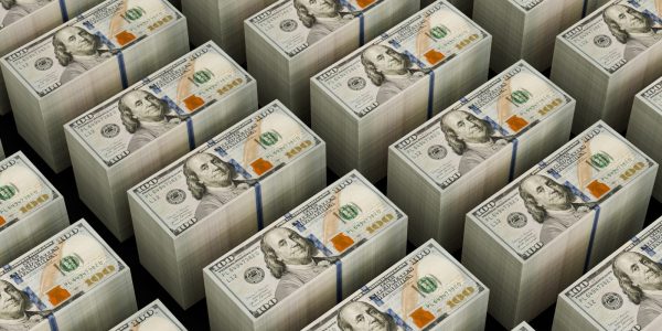 Stacks of hundred dollar bills are shown.