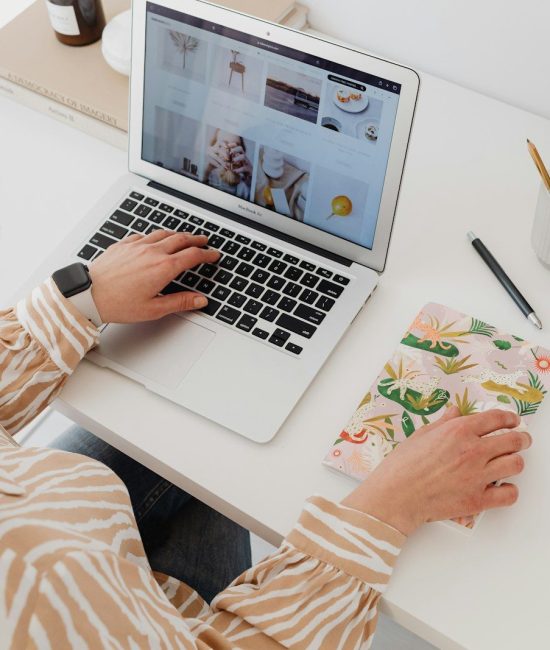 a woman working on a laptop